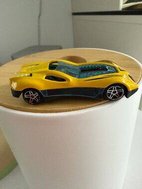 Bright Yellow Race Car Toy Cool Blue Accents